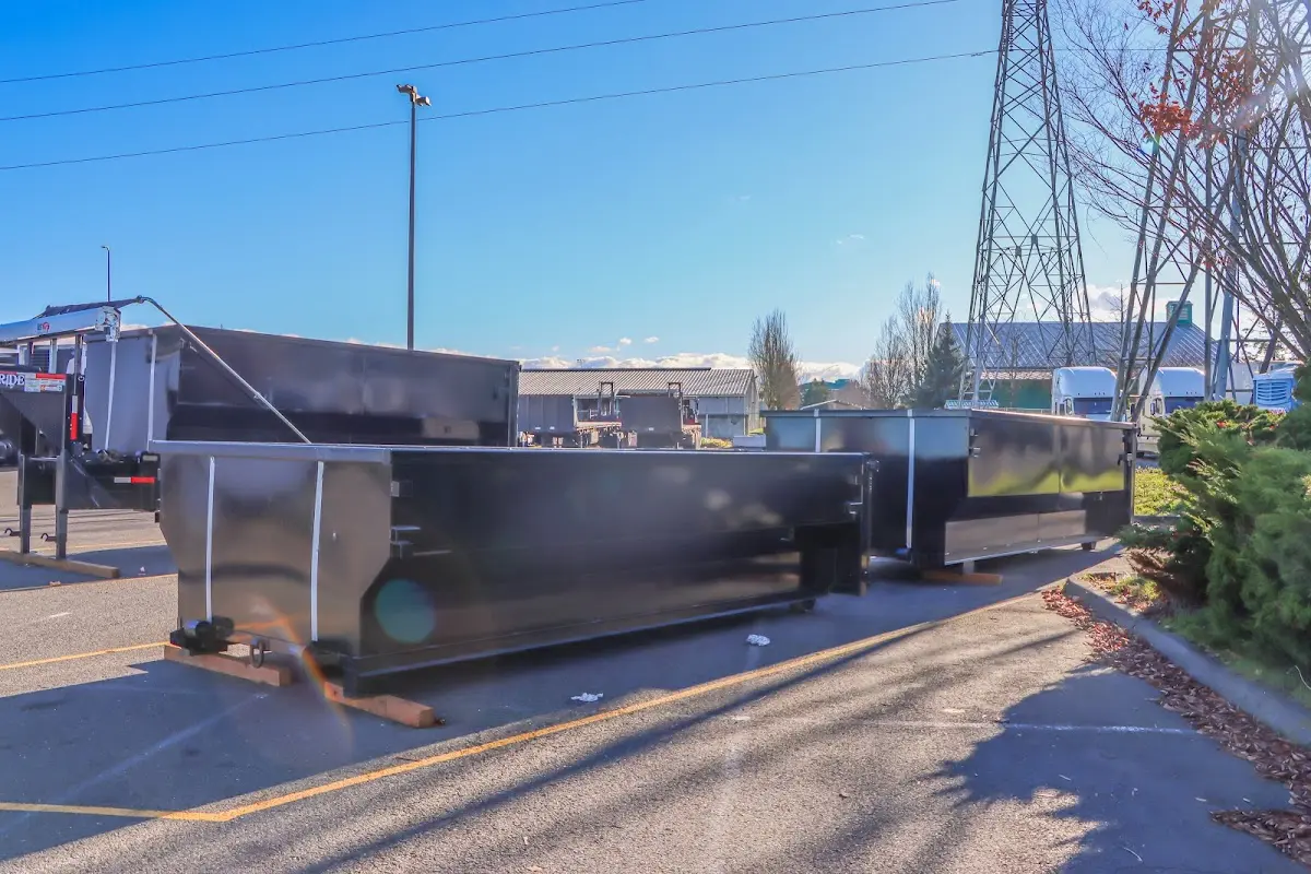 Roll-off dumpster ready for waste disposal at job site for 3 Yard Dumpster Rental in Calhoun